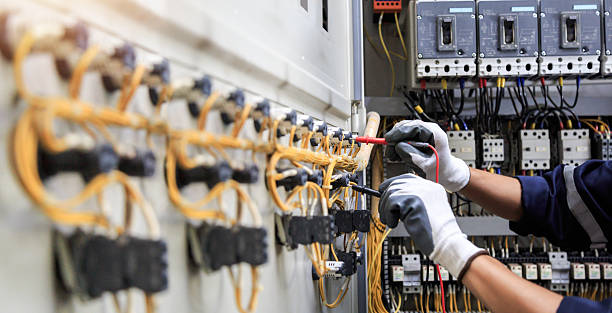 Professional Electrician technician working in La Monte, MO
